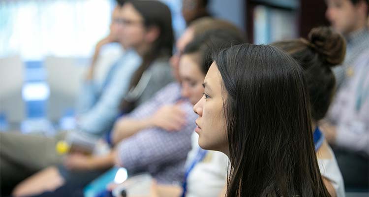 Image of female resident in class